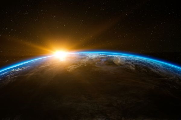 como funciona o universo planeta terra do espaço com o por do sol