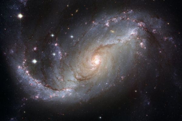 universo universo com estrelas e uma mancha cinza e verde em forma de redemoinho